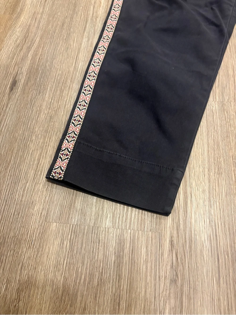 Anthropologie Black Tapered Pants with Pink Geometric Side Tape